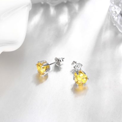 Silver 925 Earring decorated by yellow crystal bezel