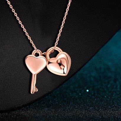 The lovers necklace has the heart key and the heart lock design made from rose gold